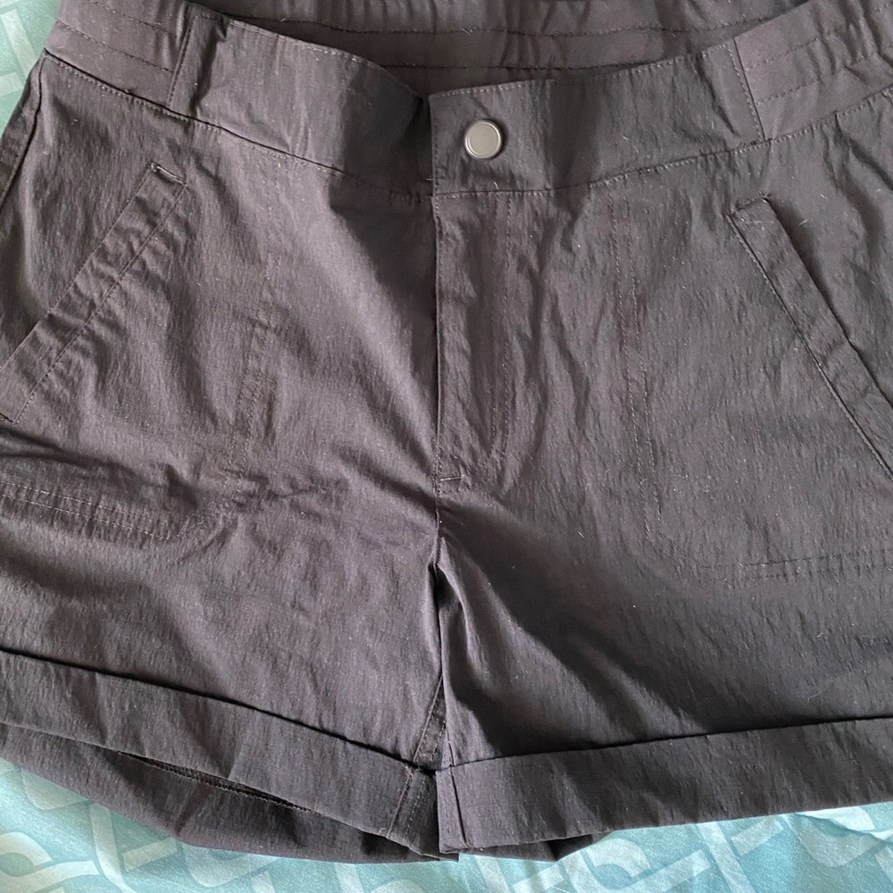 Black nylon shorts.